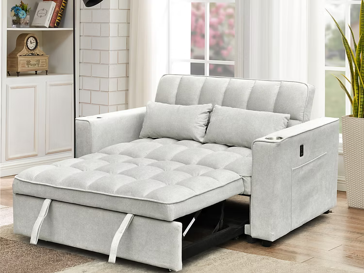Canapé-lit gris moderne déplié avec chaise longue intégrée dans un salon lumineux – Literie d’Amitié