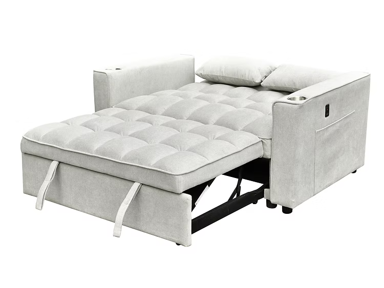 Canapé-lit gris moderne en position totalement ouverte avec matelas intégré et oreillers – Literie d’Amitié
